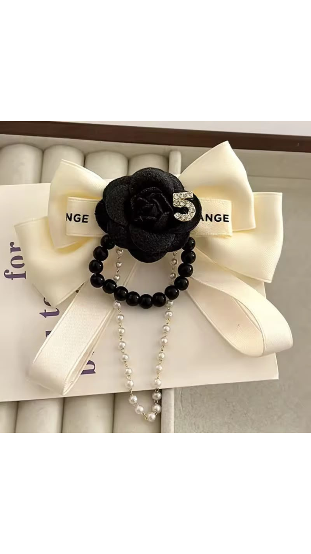 Flower pearl bow brooch