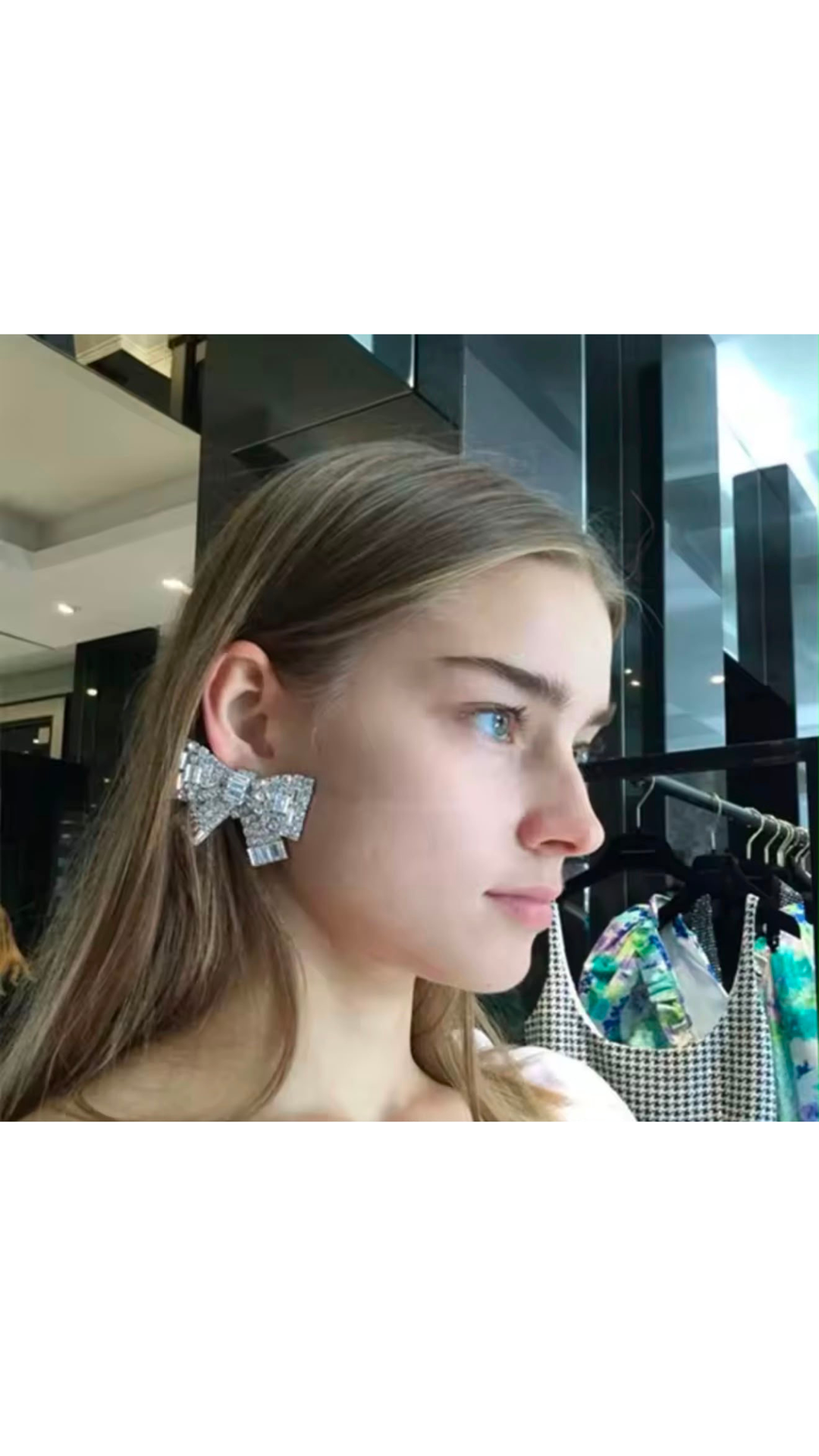 Bow embellished earrings