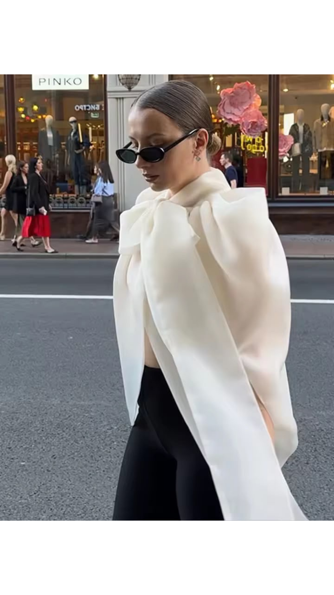 Cape bow blouse