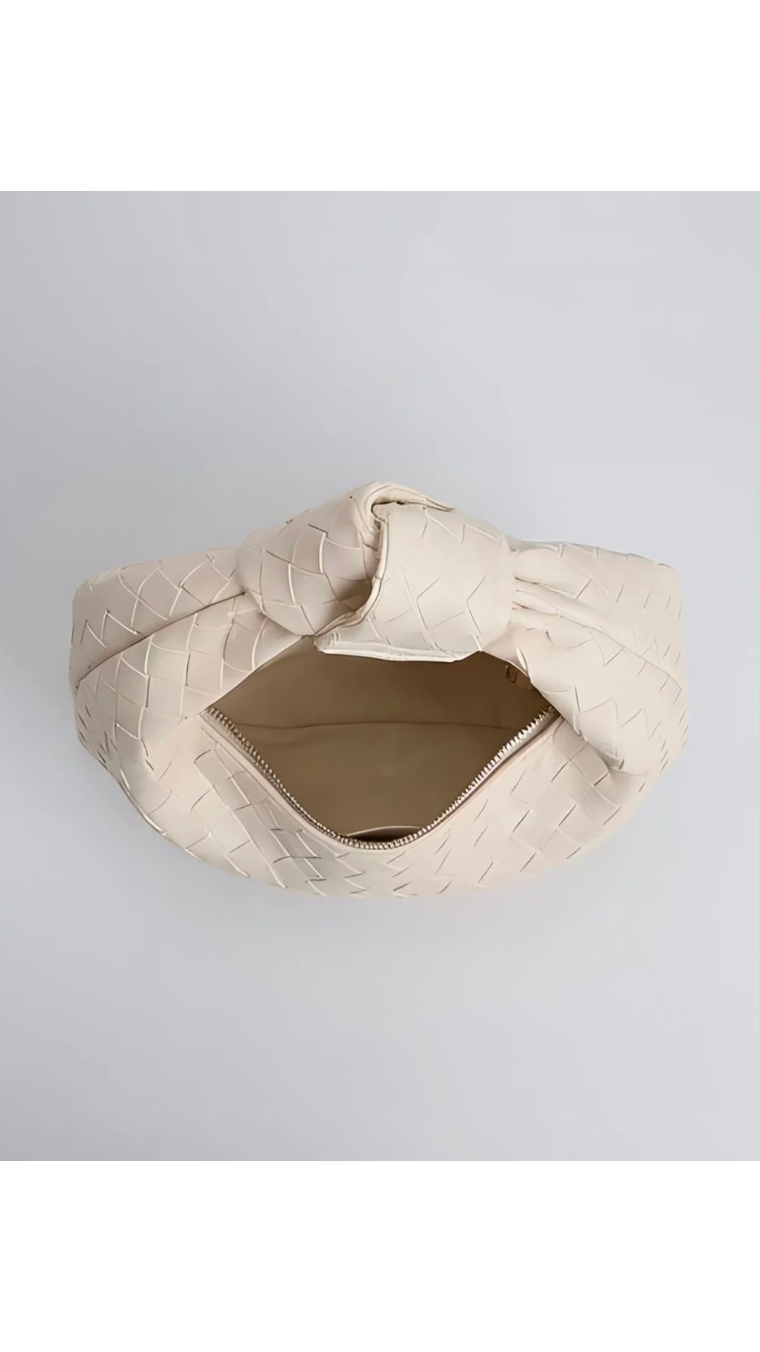 Quilted off white hand bag