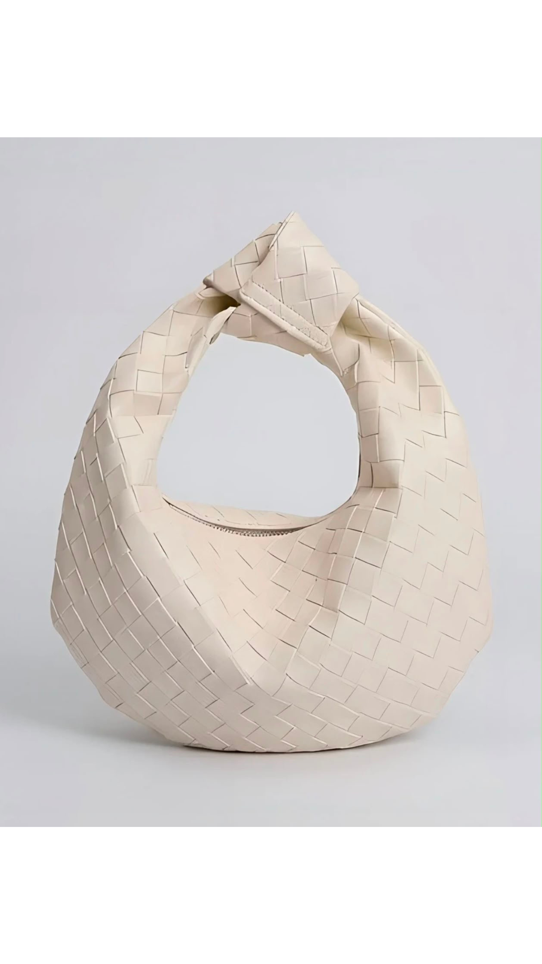Quilted off white hand bag