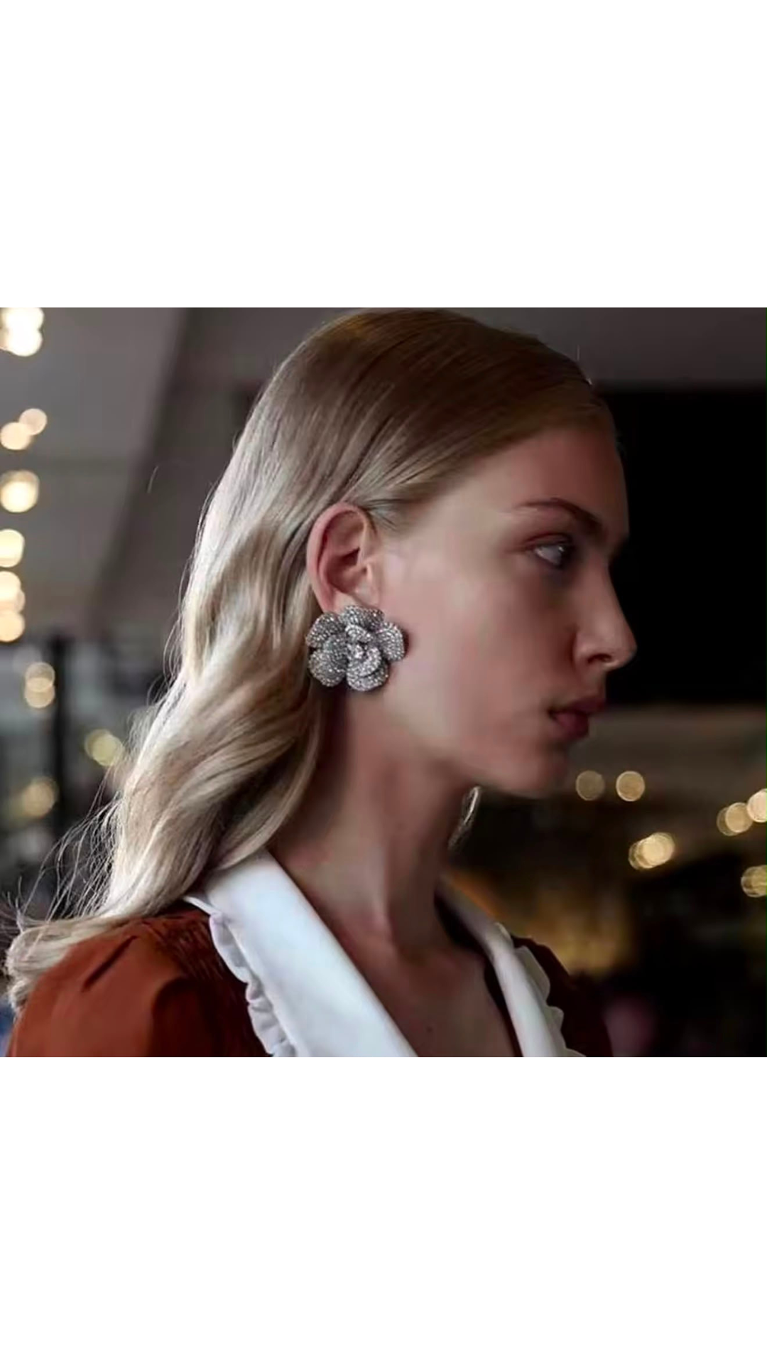 Flower embellished earrings