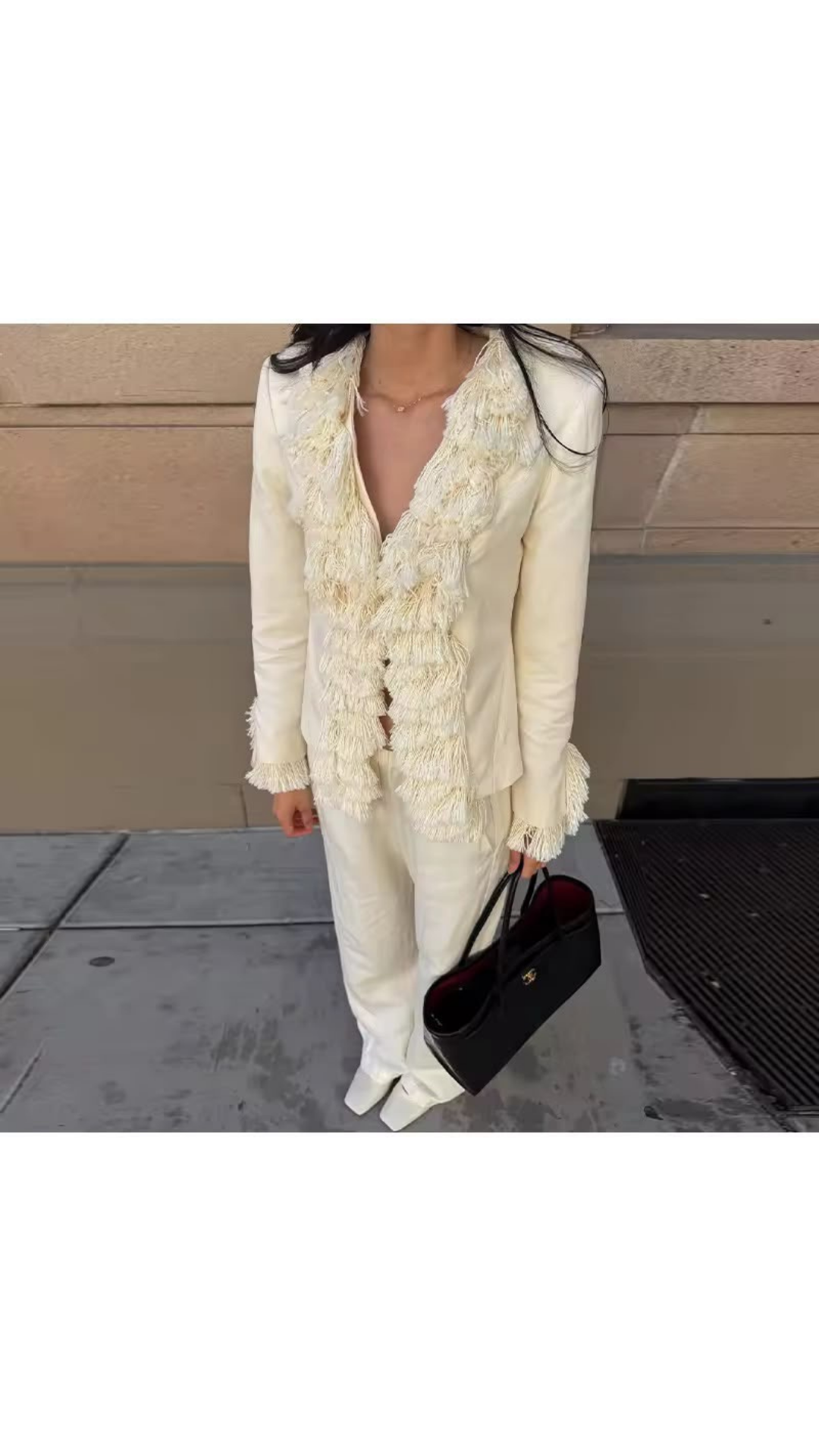 Tassel fringed top