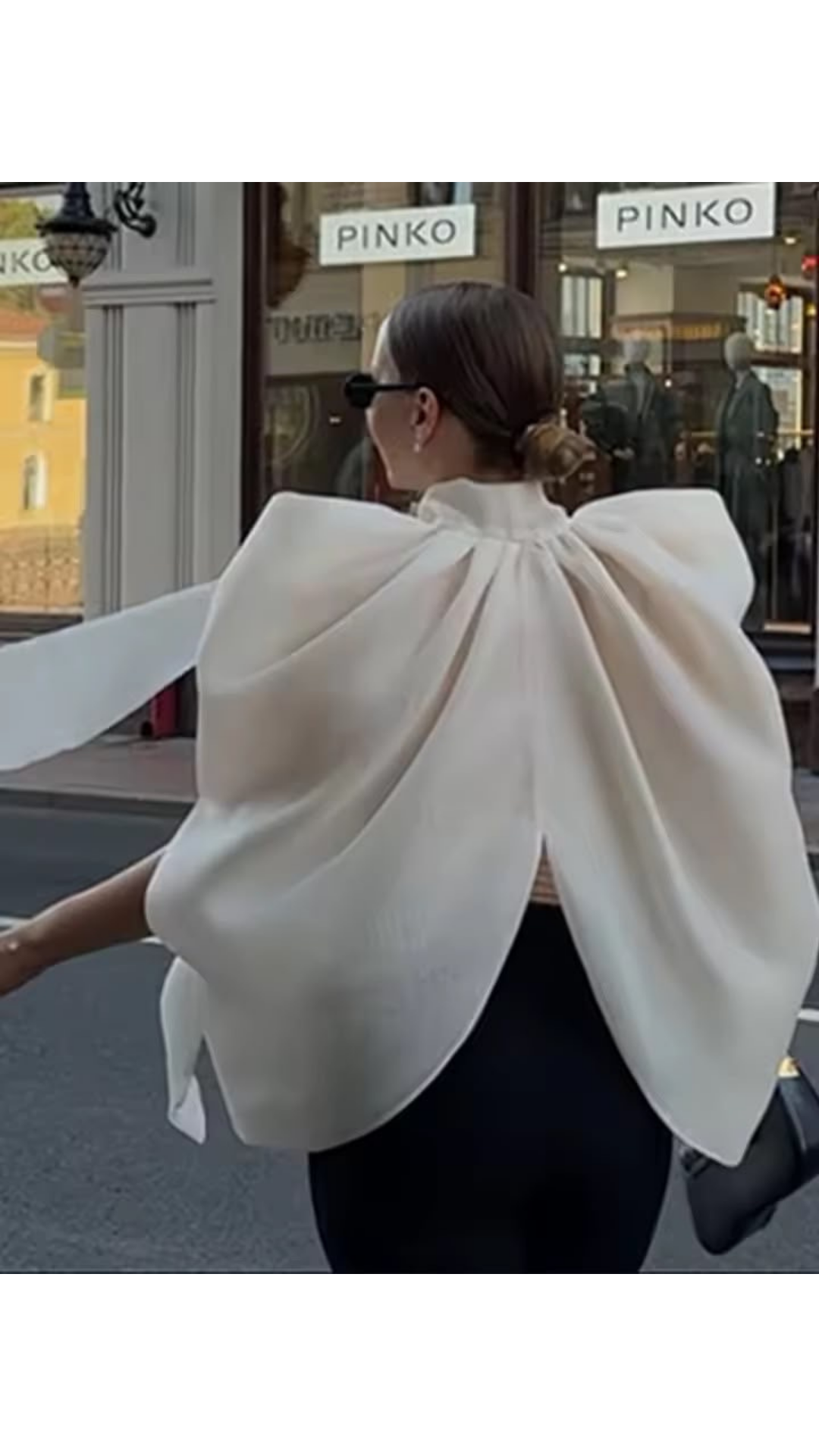 Cape bow blouse